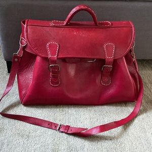 Genuine large, red, leather shoulder bag with shoulder strap and 2 clip closures